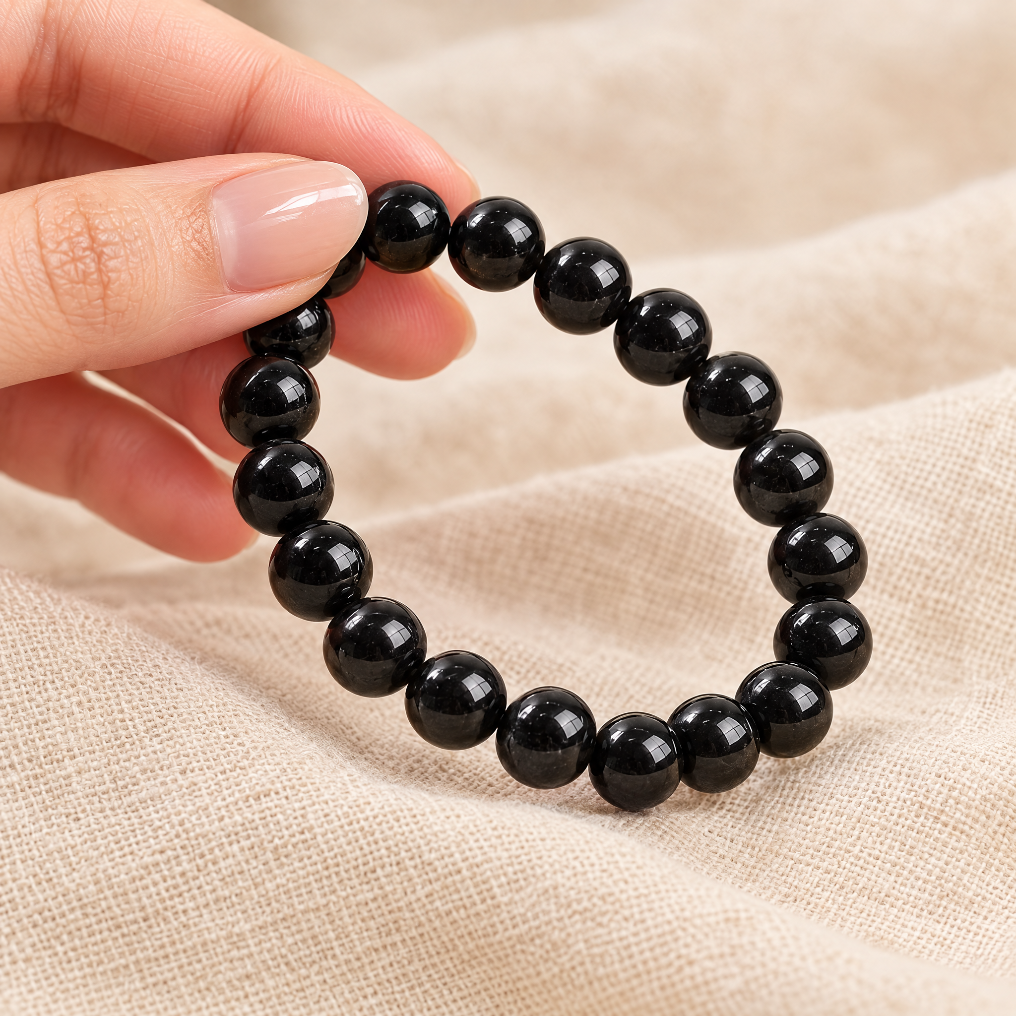 Close-up of the black tourmaline bracelet showing size and detail