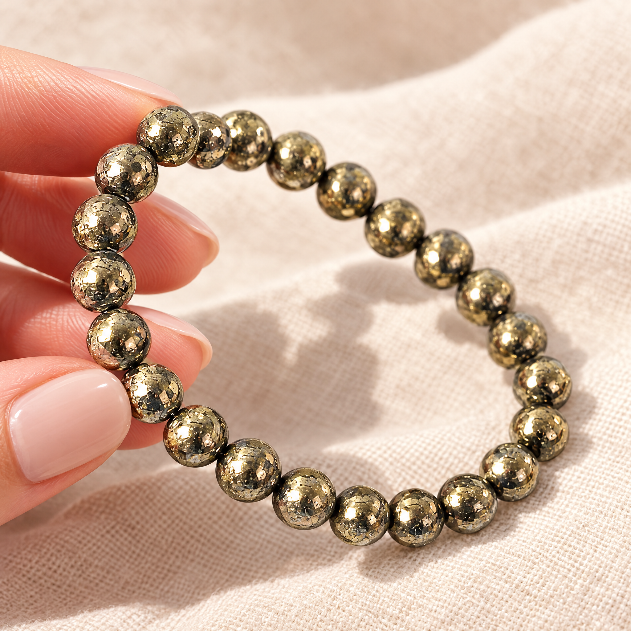 Close-up of the pyrite bracelet showing size and detail